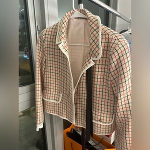 Elegant suit. Jacket and dress.